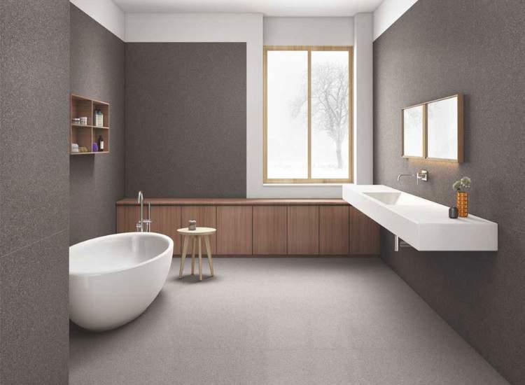 Modern bathroom with grey full body vitrified tiles floor exuding contemporary style and elegance