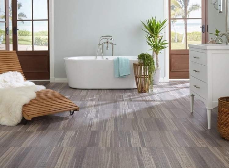 17. A spacious bathroom with an elegant sheet vinyl floor providing a warm feel under the feet