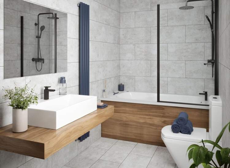 3. A contemporary bathroom featuring white ceramic tile and wood decor exuding a clean and minimalistic aesthetic