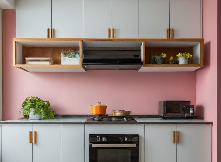 Modern kitchen showcasing vibrant pink walls, contemporary cabinets, and elegant countertops, creating a bold and stylish space.