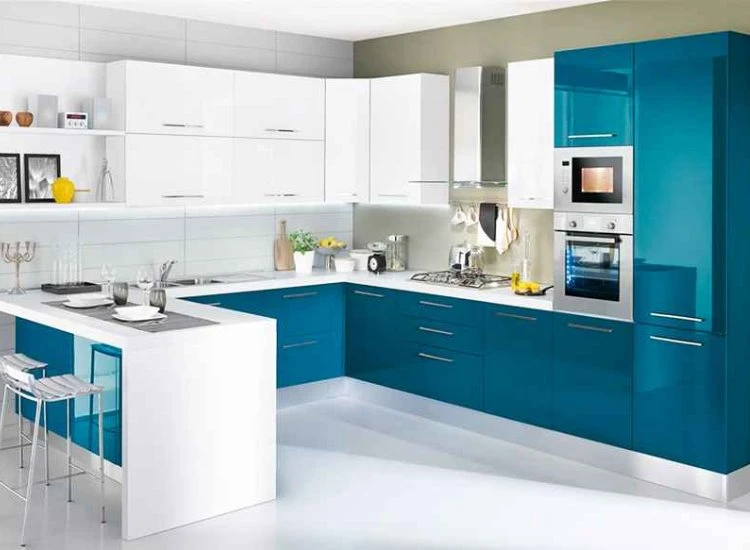 26. Open Kitchen Blue and white themed open kitchen design showcasing a bright, airy atmosphere with stylish cabinetry and cohesive color accents.