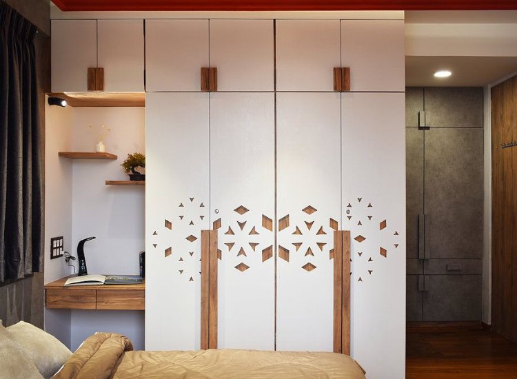 Patterned wardrobe design, featuring unique graphics or textures that add visual interest and personality to any bedroom decor.