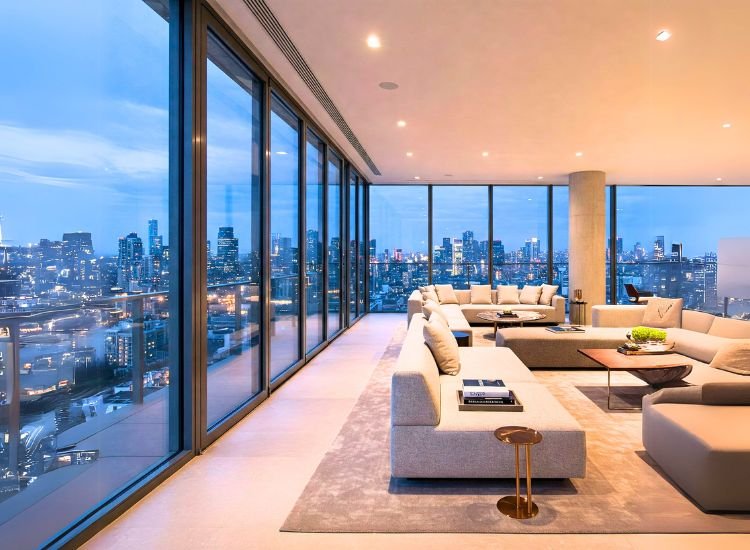 Penthouse Luxurious modern penthouse with panoramic city views, open-plan interiors, and elegant decor showcasing what makes a penthouse special.