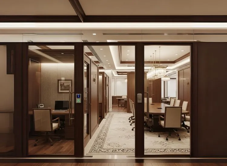 Traditional Corporate Office A traditional corporate office setup with private cabins and partitioned workspaces, reflecting corporate office interior design and effective office interior design ideas for privacy.