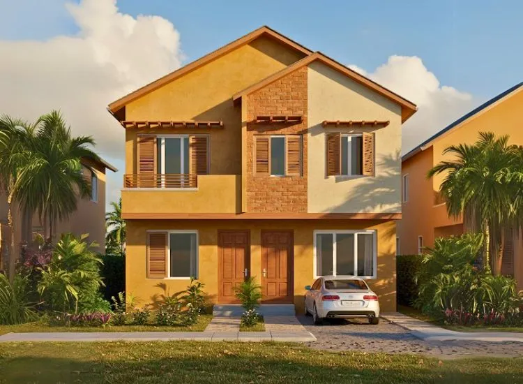 West India Earth Tones West Indian home front elevation design with earthy tones and contemporary facades, blending tradition and modernity in a double-floor exterior.