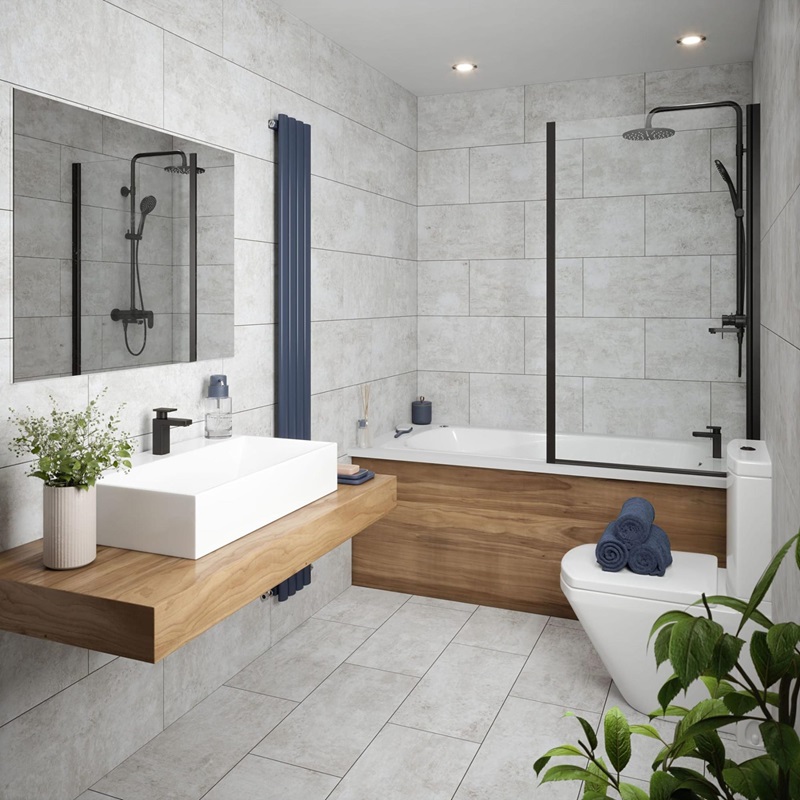 A contemporary bathroom featuring white ceramic tile and wood decor, exuding a clean and minimalistic aesthetic