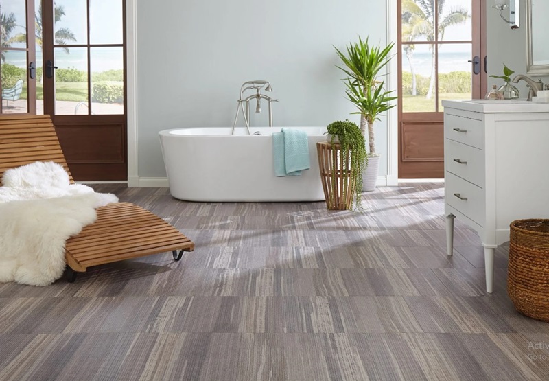 A spacious bathroom with an elegant sheet vinyl floor, providing a warm feel under the feet