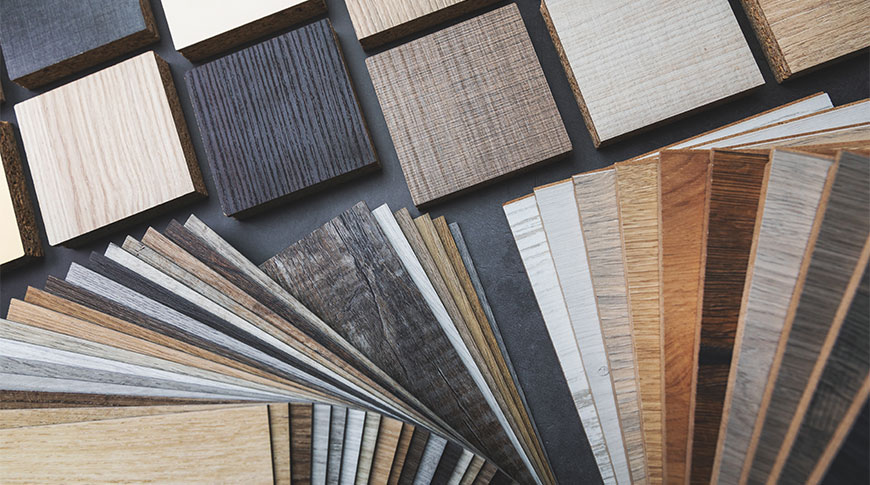 A variety of laminate samples are neatly arranged showcasing their unique colors and textures