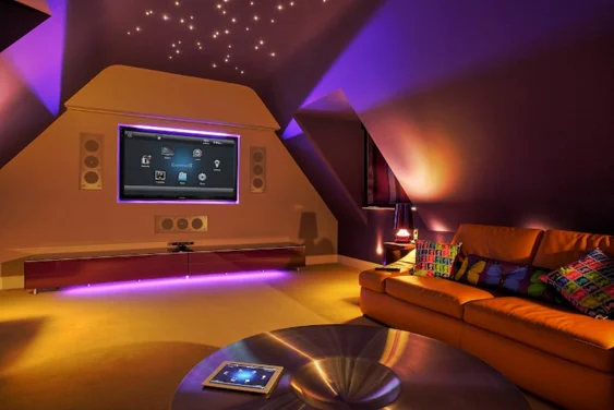 Living room with sleek TV unit and purple mood lighting creating a relaxing atmosphere with modern technology