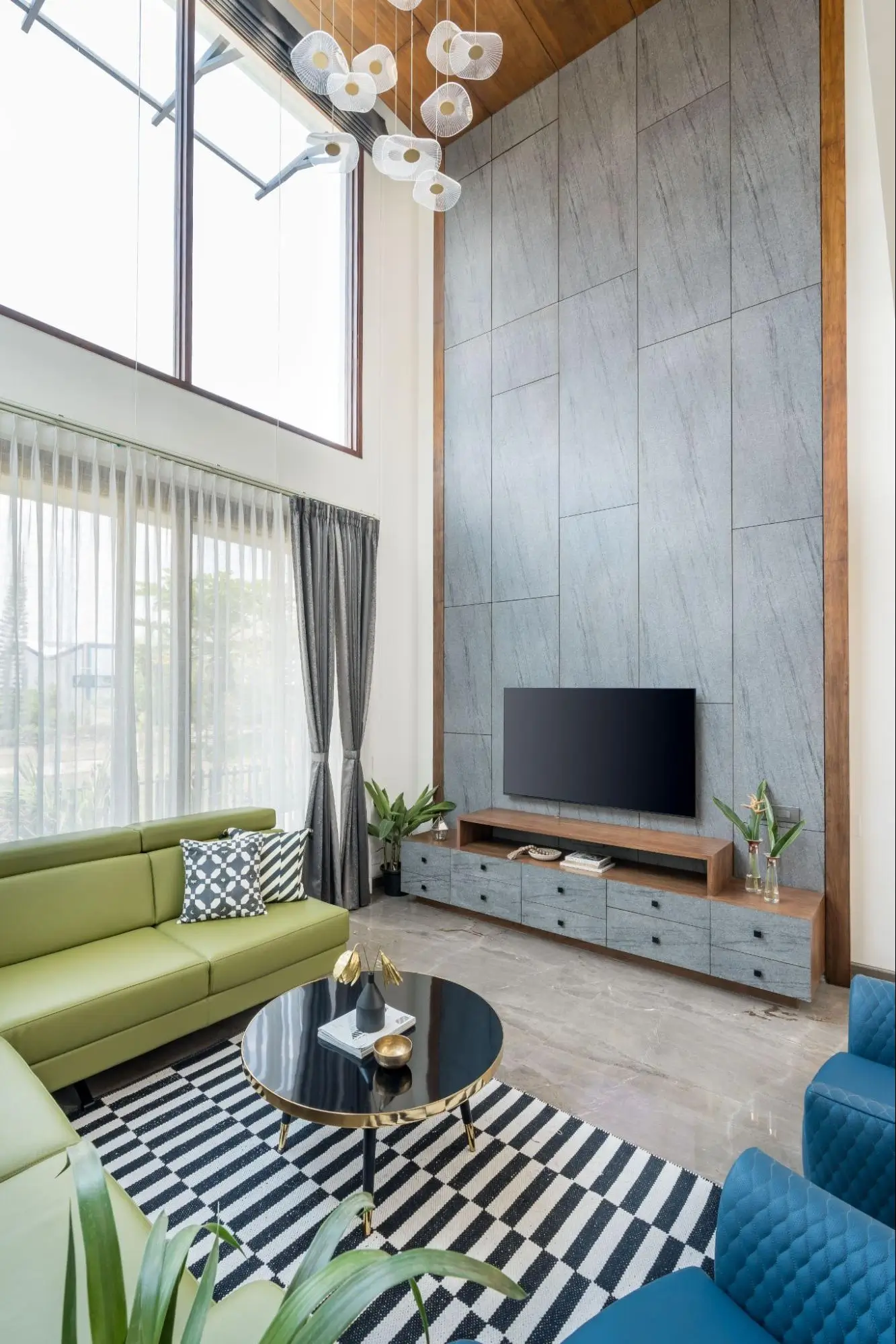 Luxurious tv unit design catching guests' eyes in double height living room