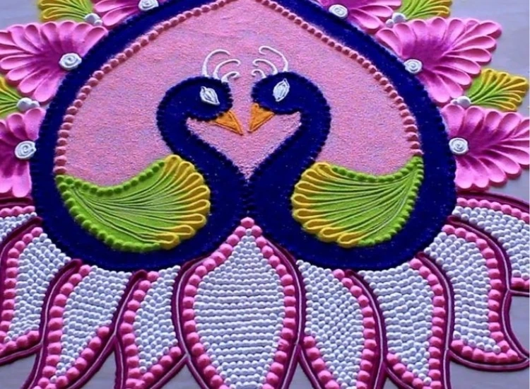 10.Rangoli Peacock rangoli design of a peacock, featuring vibrant colors and intricate patterns that celebrate beauty and festival