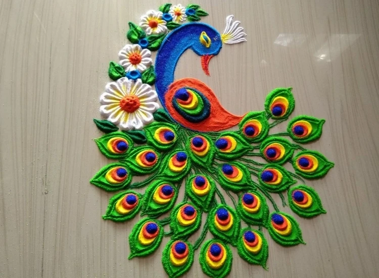 11. Peacock Rangoli Intricate rangoli design inspired by peacock feathers, showcasing vibrant blues and greens in detailed patterns.