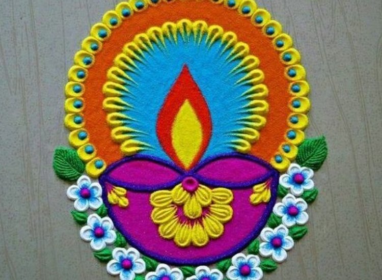 Vibrant rangoli art with traditional diyas, enhancing the festive atmosphere for the Diwali festival