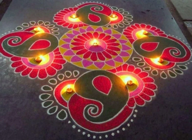 15.Diya Rangoli Design Intricate diya rangoli showcasing a blend of colors and lights, symbolizing warmth and joy during Diwali