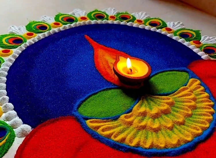 16 .You Tube Colorful rangoli pattern with glowing diyas arranged artfully, creating a welcoming ambiance for Diwali.
