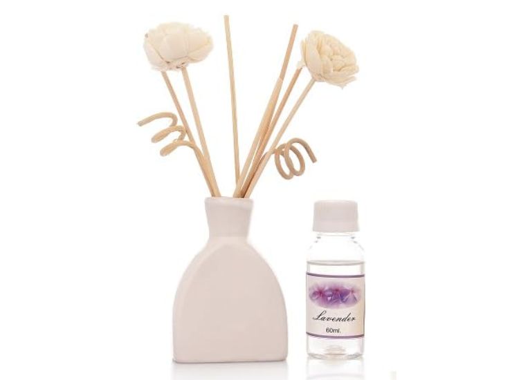 Experience the essence of nature with our chemical-free, undiluted lavender diffuser oil, complete with 8 reed sticks in a ceramic pot