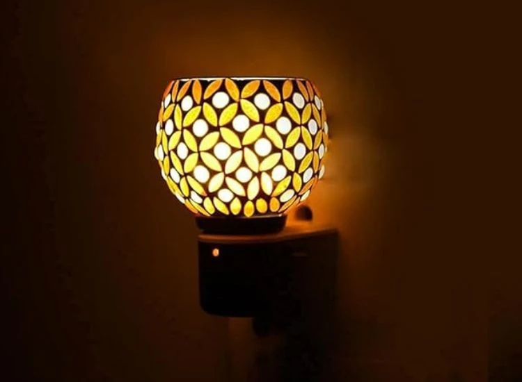 20. Kapoor Dani Cum LED Lamp Light This multifunctional candle scent oil camphor burner not only disperses your favorite fragrances but also adds moisture
