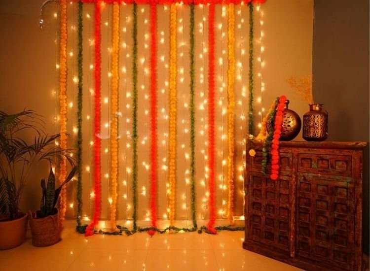 Diwali lighting photo of traditional diyas and modern LED lights illuminating a beautifully decorated space."