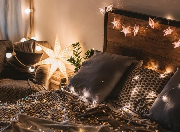 32. Bedroom Lighting "Captivating Diwali images featuring diyas and candles placed around a beautifully designed bedroom lighting."