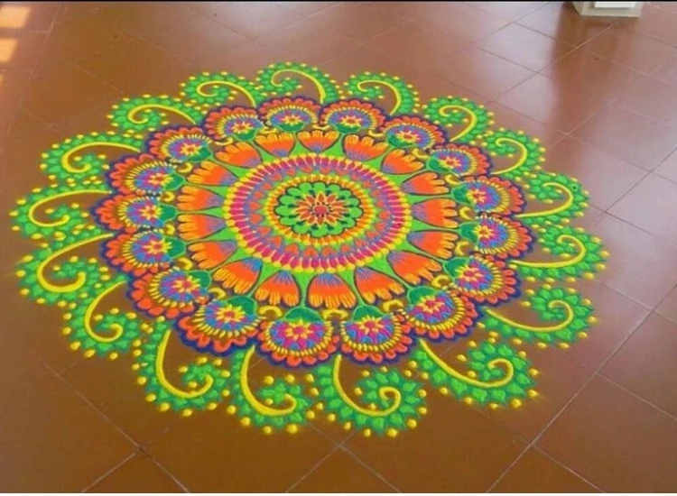 40 .Kolam Rangoli Kolam rangoli features intricate, symmetrical patterns made from rice flour or colored powders, often adorning doorsteps to welcome guests.
