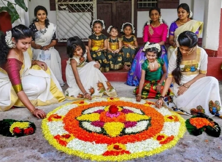 42 .Pookalam Rangoli Colorful pookalam rangoli featuring intricate floral patterns, vibrant hues of yellow, pink, and green, set on a white background.