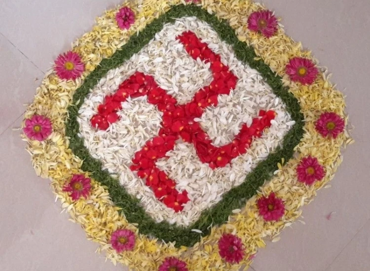 5. Swastick Floral rangoli design of a swastick, featuring vibrant colors and intricate patterns that celebrate beauty and grace