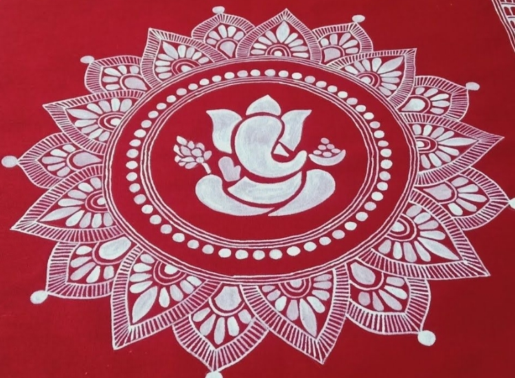 Aipan Ganesh rangoli featuring intricate designs and vibrant colors, beautifully depicting Lord Ganesh for festive celebrations.