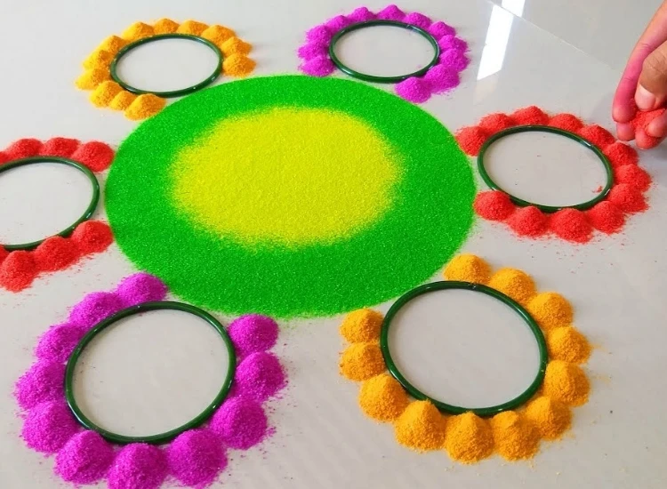 53. Home Made Tool Rangoli Home tool bangle rangoli featuring creative patterns made from colorful bangles, adding a unique and festive touch to decor.