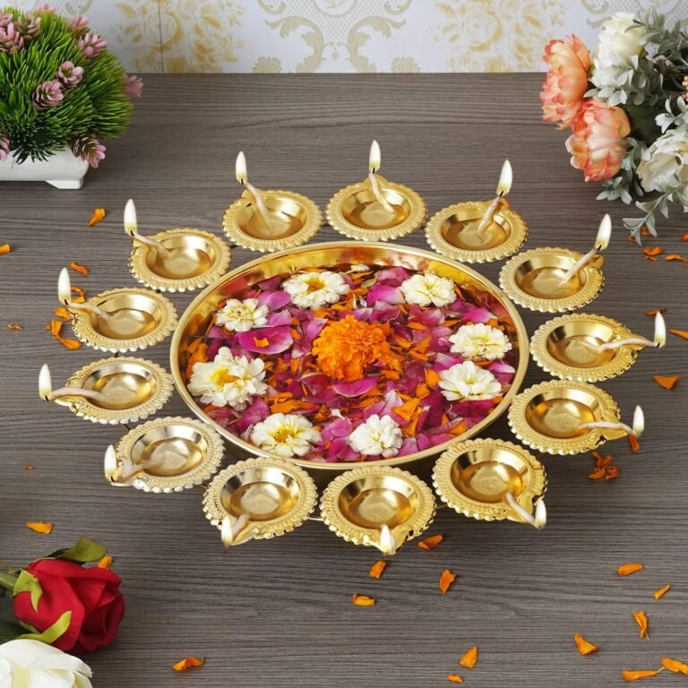 Urli decoration for diwali with diyas and flowers and petals floating in water