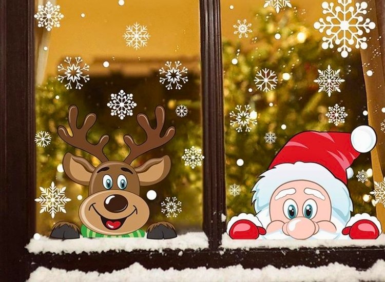 "Snowflake decals on the windows add a wintery touch. christmas tree png completes the festive decoration."