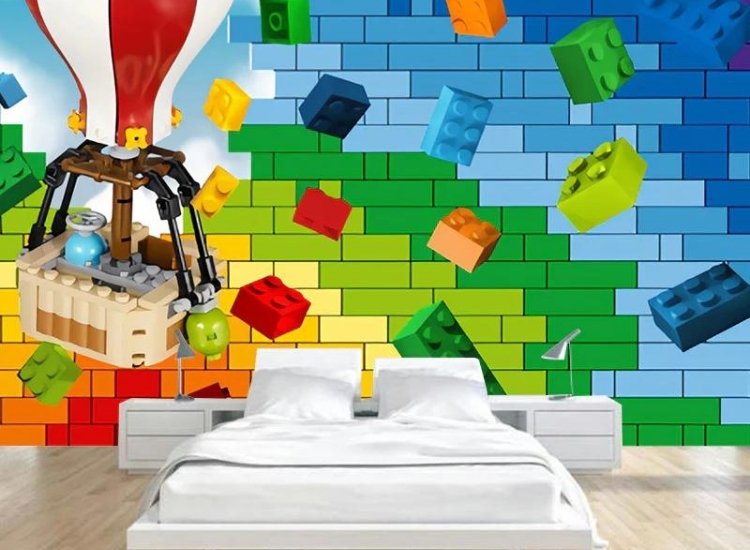 LEGO land created with a bright coloured wallpaper featuring colourful and geometric block patterns