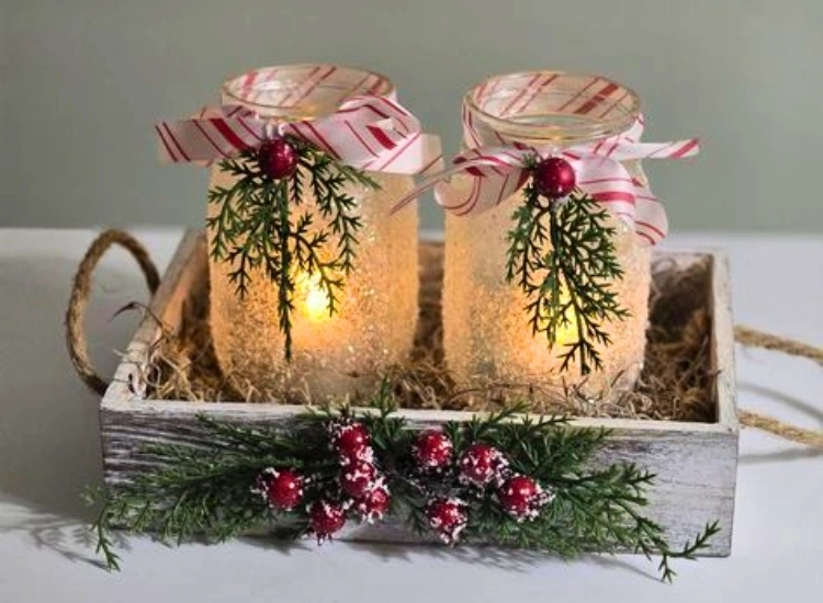 "Mason jars decorated with ribbons and filled with fairy lights for a cozy holiday glow. Christmas tree drawing image included."