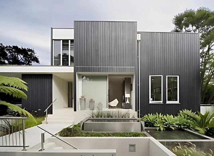 13. Black painted shadow cladding home