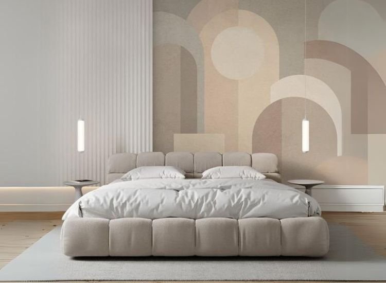 Bedroom with different forms, cushions and rug with geometric forms while the wallpaper with curve lines and circular shaped design.