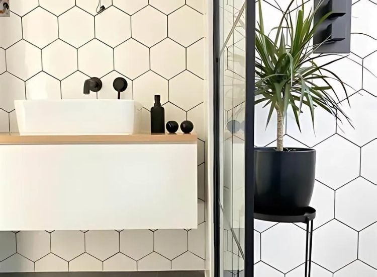 Black and white geometric bathroom wallpaper.