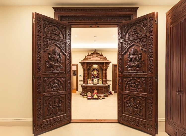 Carved panel double door Design.