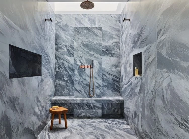 22. Bardiglio marble bathroom A luxurious bathroom design with elegant Bardiglio marble walls and flooring, creating a sophisticated and timeless ambiance.