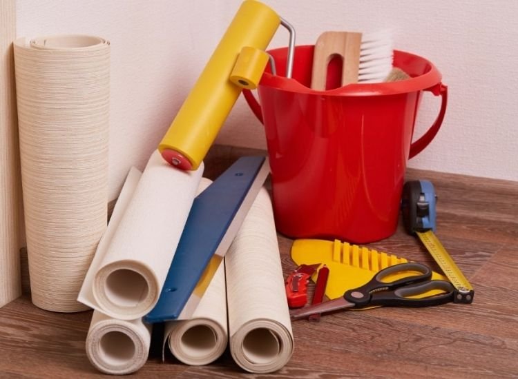 Tools for bathroom wallpaper installation.