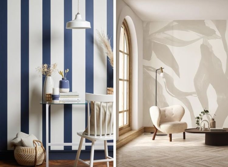 Blue and white striped walls with a white table and hanging lamp. And a living room featuring an abstract leaf-patterned wall.