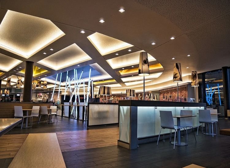 31. Well lit restaurant area with different color schemes and temperatures