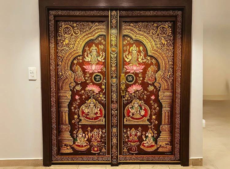 7. Artistic Pooja Room Door Design With Handpainting 7. Artistic Pooja Room Door Design With Handpainting