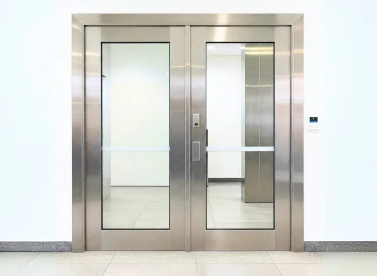 15. Steel Door Sturdy steel door design, combining strength and security with sleek aesthetics for modern house door types.