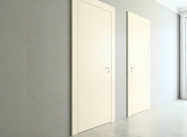 22. Flush Door Sleek flush door design offering a smooth, modern finish and versatility for a range of house door types and contemporary interiors.