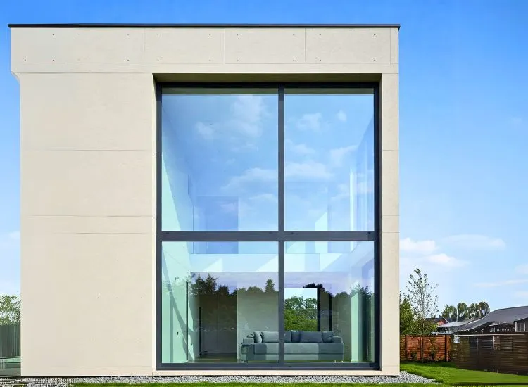 7. Modern Minimalist Windows Sleek modern home with minimalist window designs, emphasizing clean lines and functional elegance for a contemporary living space.