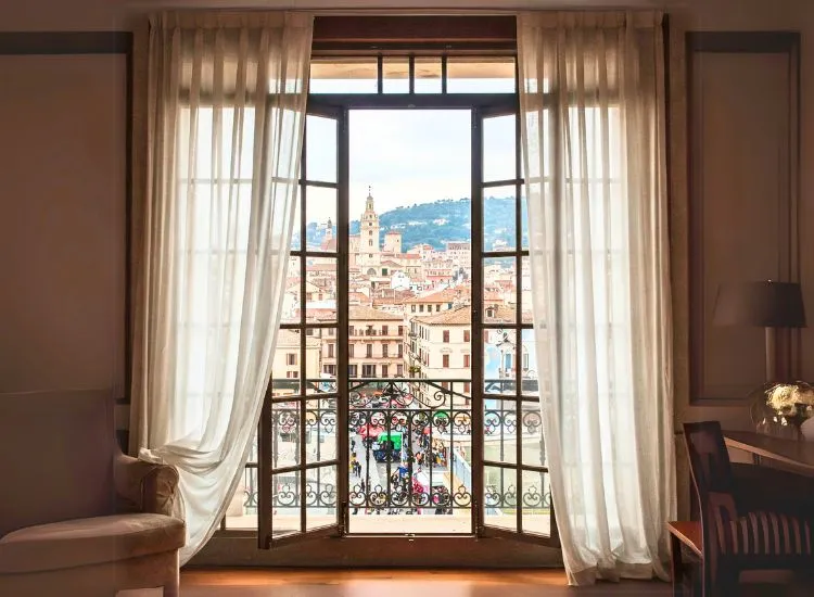 8. French Windows Sophisticated home with classic French windows, blending elegance and functionality for a bright and airy interior.