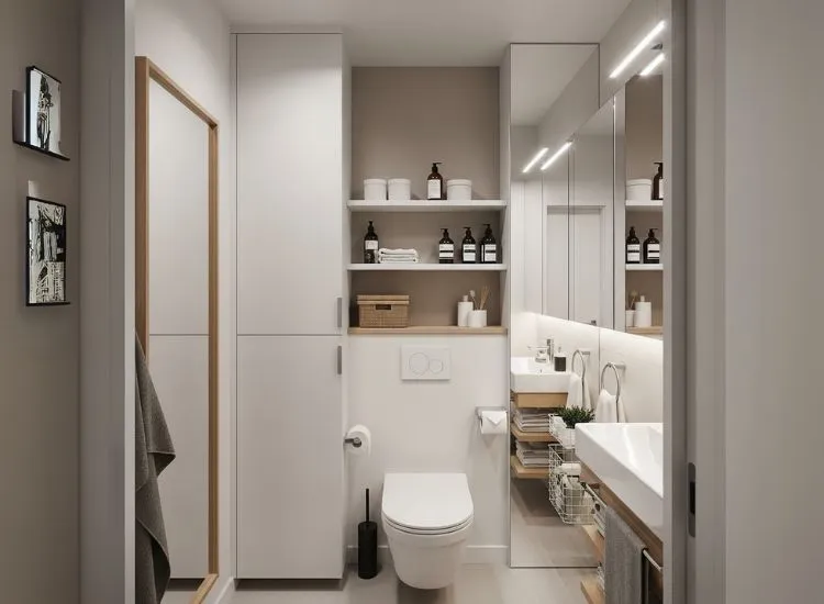 Small Bathroom Ideas Go Vertical with Storage Clever small bathroom ideas using vertical storage and wall-mounted cabinets to enhance functionality in compact spaces.
